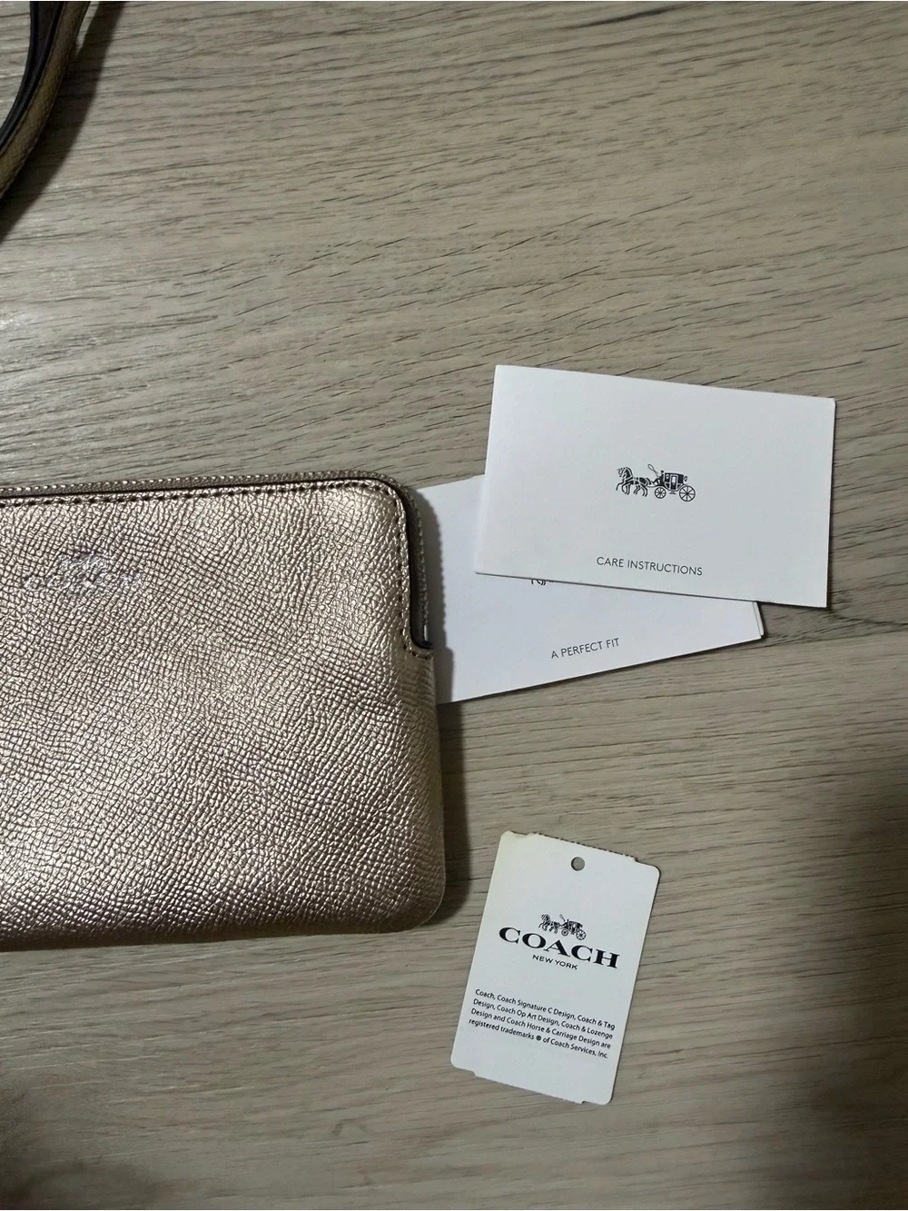 NWT COACH Corner Zip Wristlet Metallic White Gold Coated Canvas